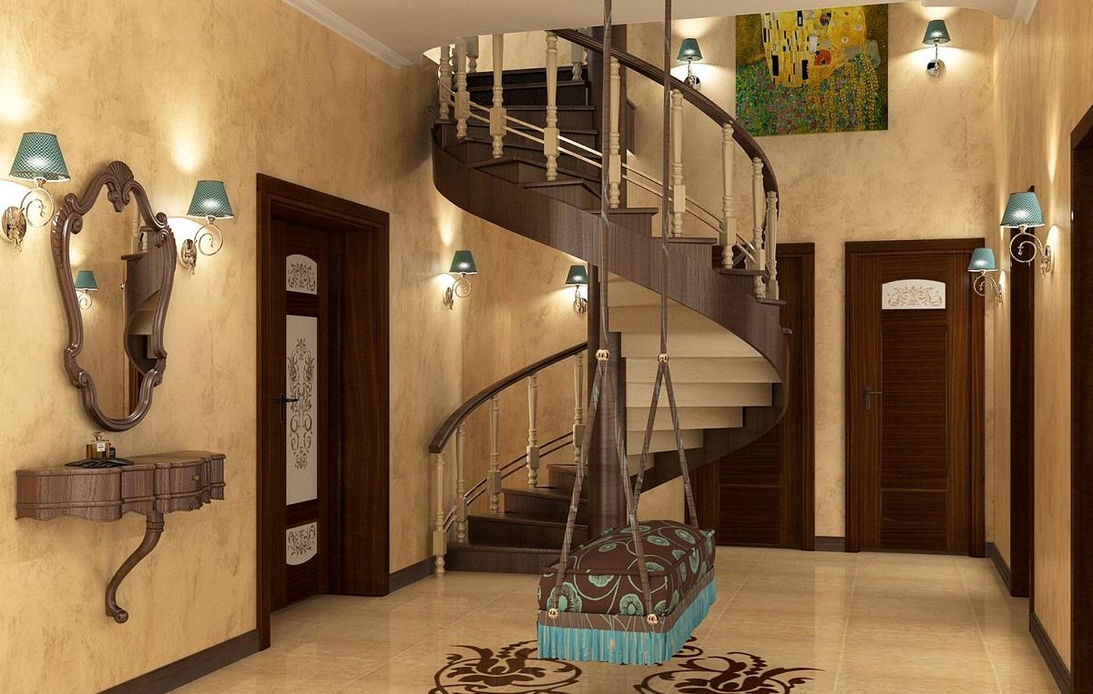 Лестница на второй этаж должна гармонично сочетаться по цвету и форме с интерьером холла 