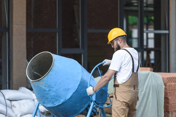 Construction Worker Hardhat Protective Googles Working Concrete Mixer Construction Site — стоковое фото